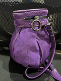 MIMCO purple leather and canvas drawstring crossbody bag with embossed logo and large ring pull.