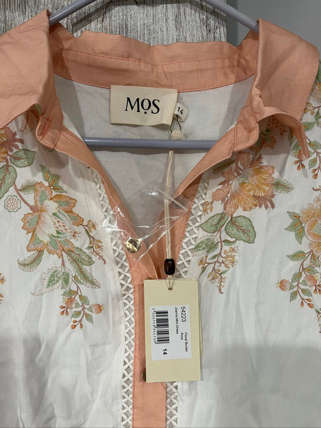 Mos green and white floral border print shirt dress with lace trims and gold-tone buttons.