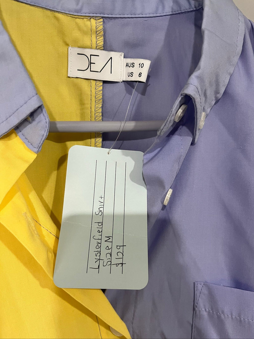 DEA colour block shirt blue and yellow with buttoned chest pocket and collar.