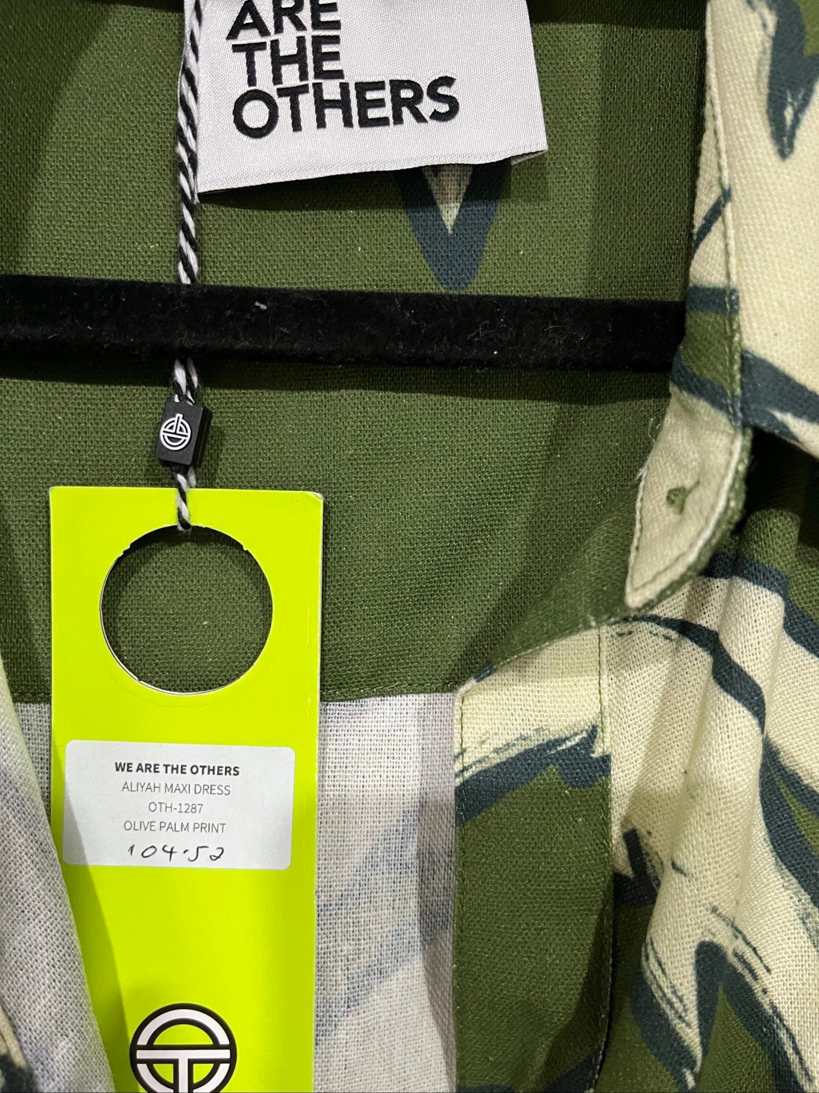 WE ARE THE OTHERS olive maxi dress with cream palm print, button-down style, cotton fabric.