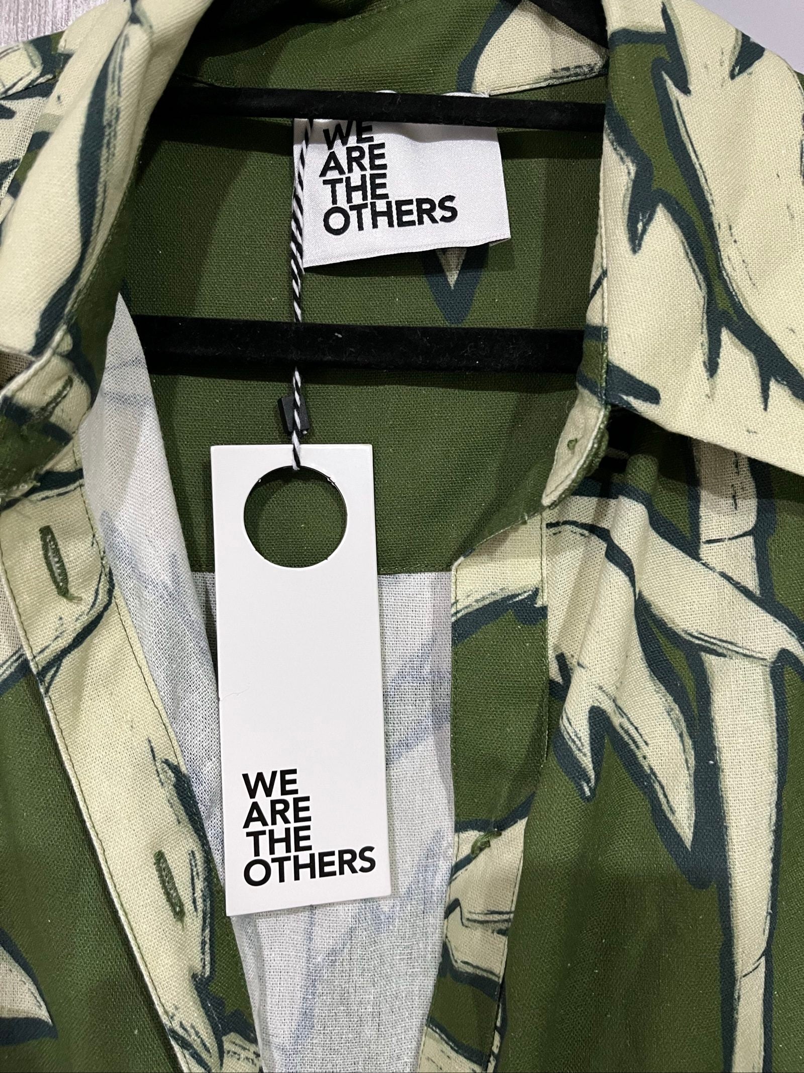 WE ARE THE OTHERS olive maxi dress with cream palm print, button-down style, cotton fabric.