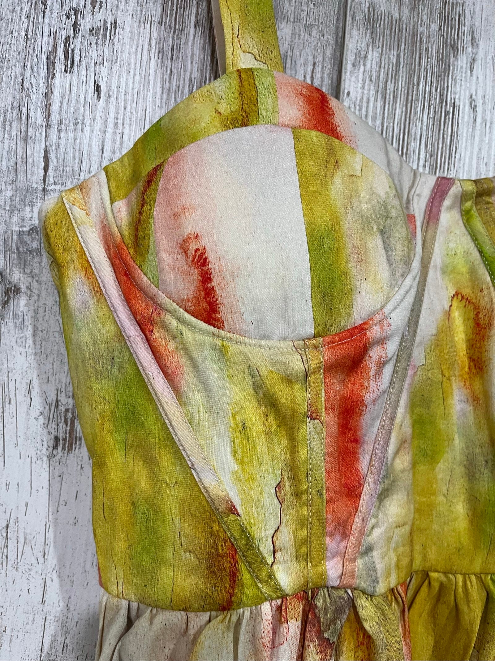 Aureta Studios multi-coloured abstract print corset dress with adjustable straps and gathered waist.