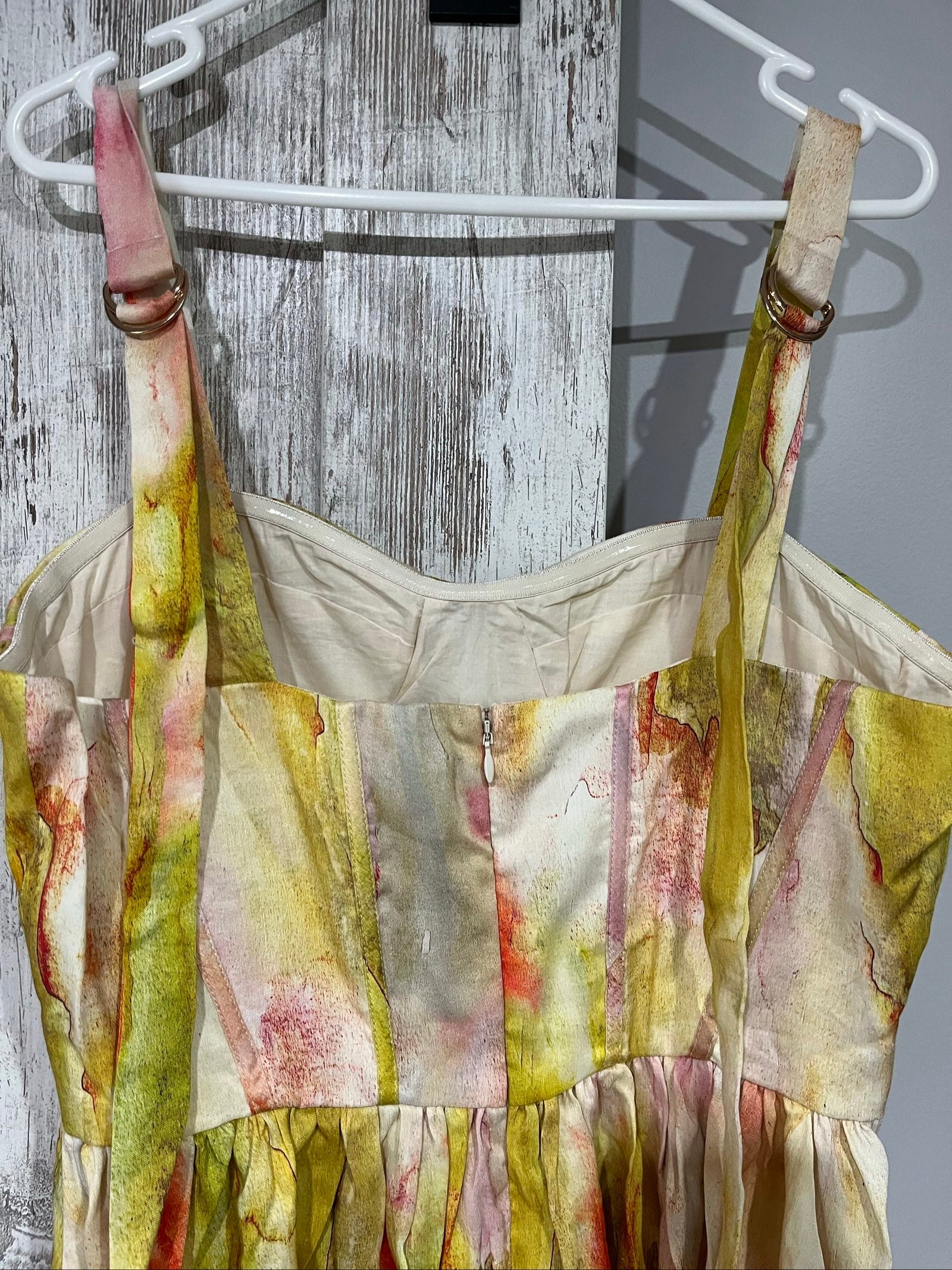 Aureta Studios multi-coloured abstract print corset dress with adjustable straps and gathered waist.