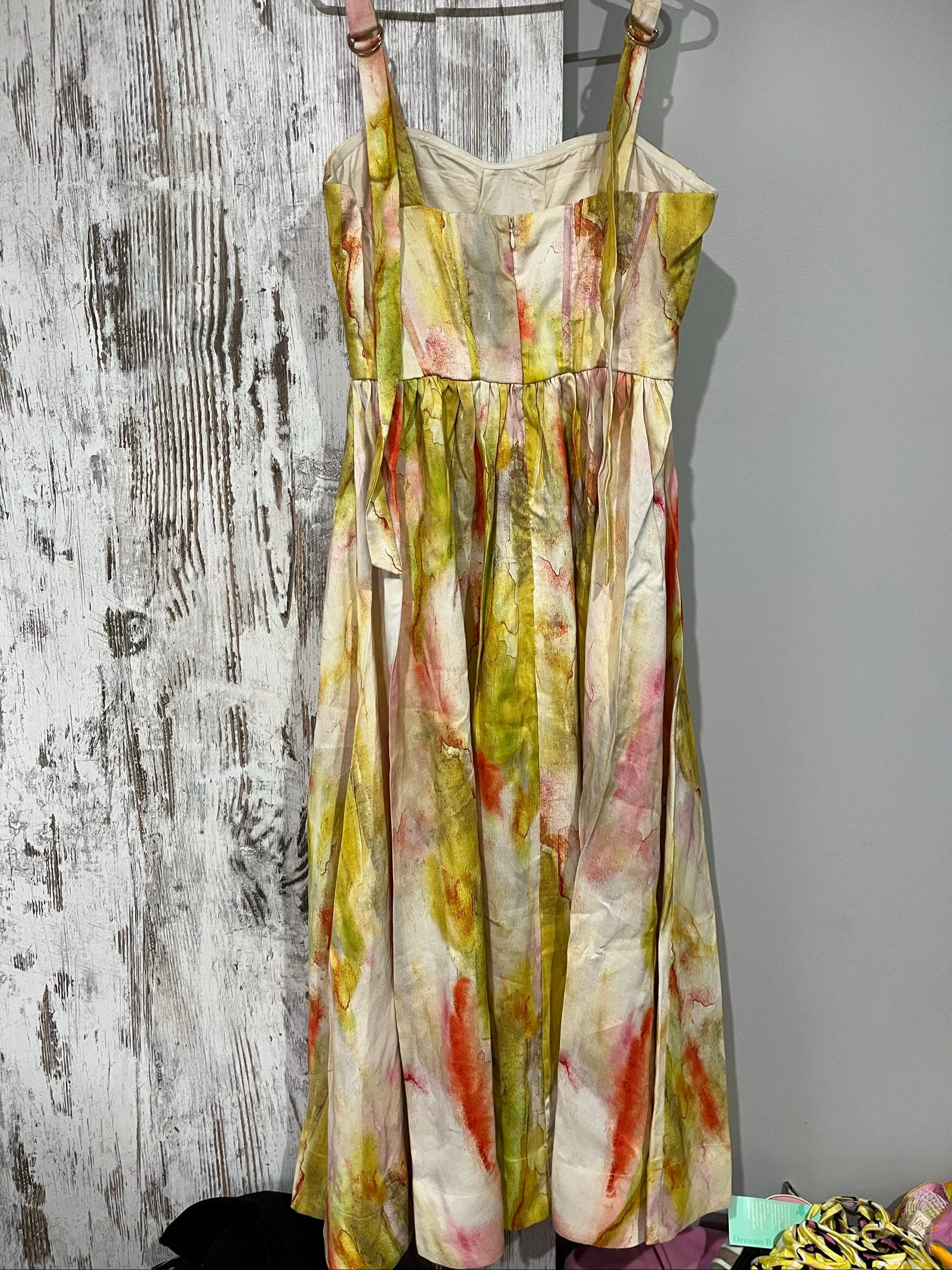 Aureta Studios multi-coloured abstract print corset dress with adjustable straps and gathered waist.