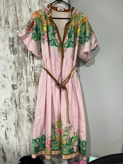27SE brown midi dress with pink and green floral print, short puff sleeves, matching belt.