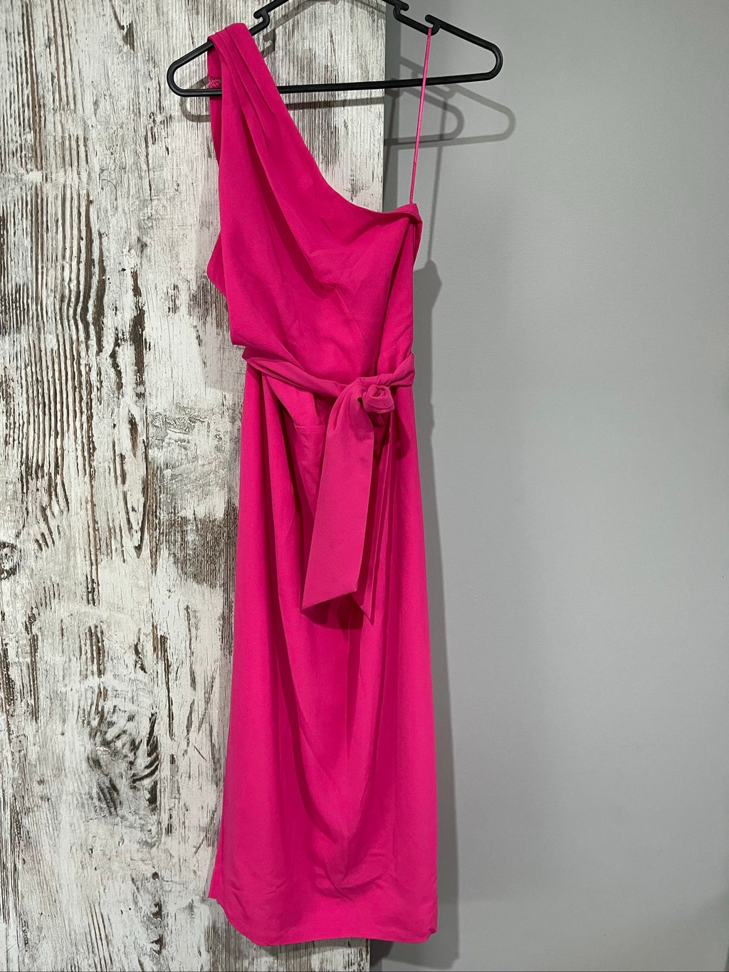 Bianca and Bridget pink one shoulder dress with tie belt and textured fabric.