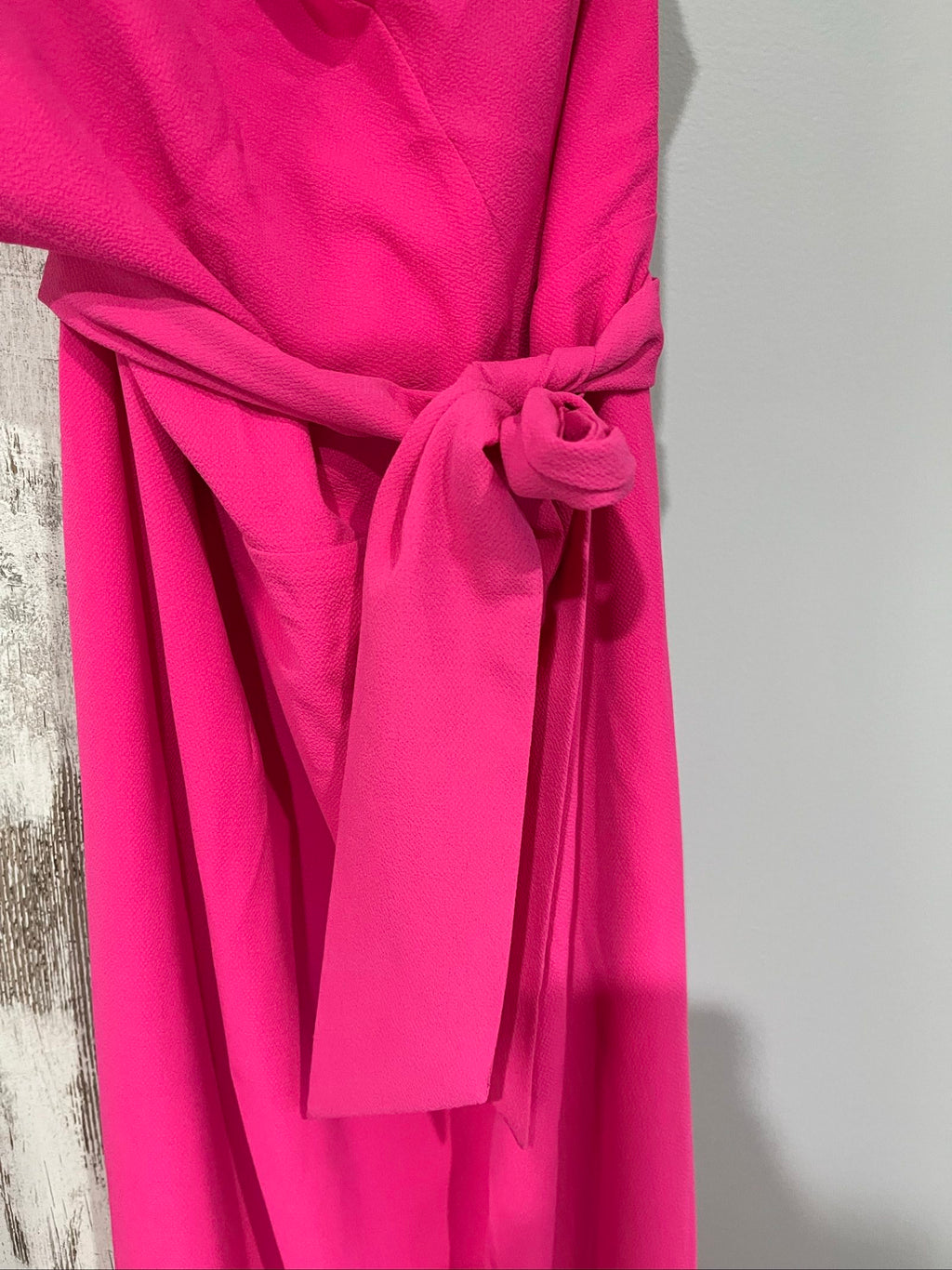Bianca and Bridget pink one shoulder dress with tie belt and textured fabric.