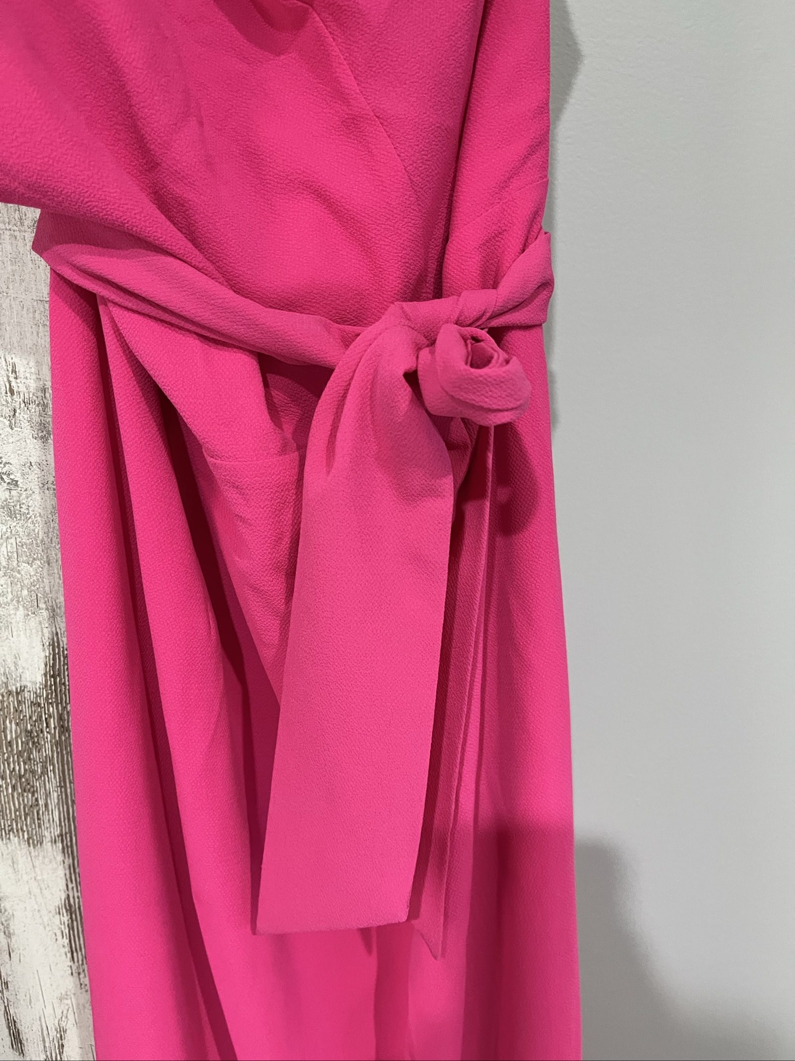 Bianca and Bridget pink one shoulder dress with tie belt and textured fabric.