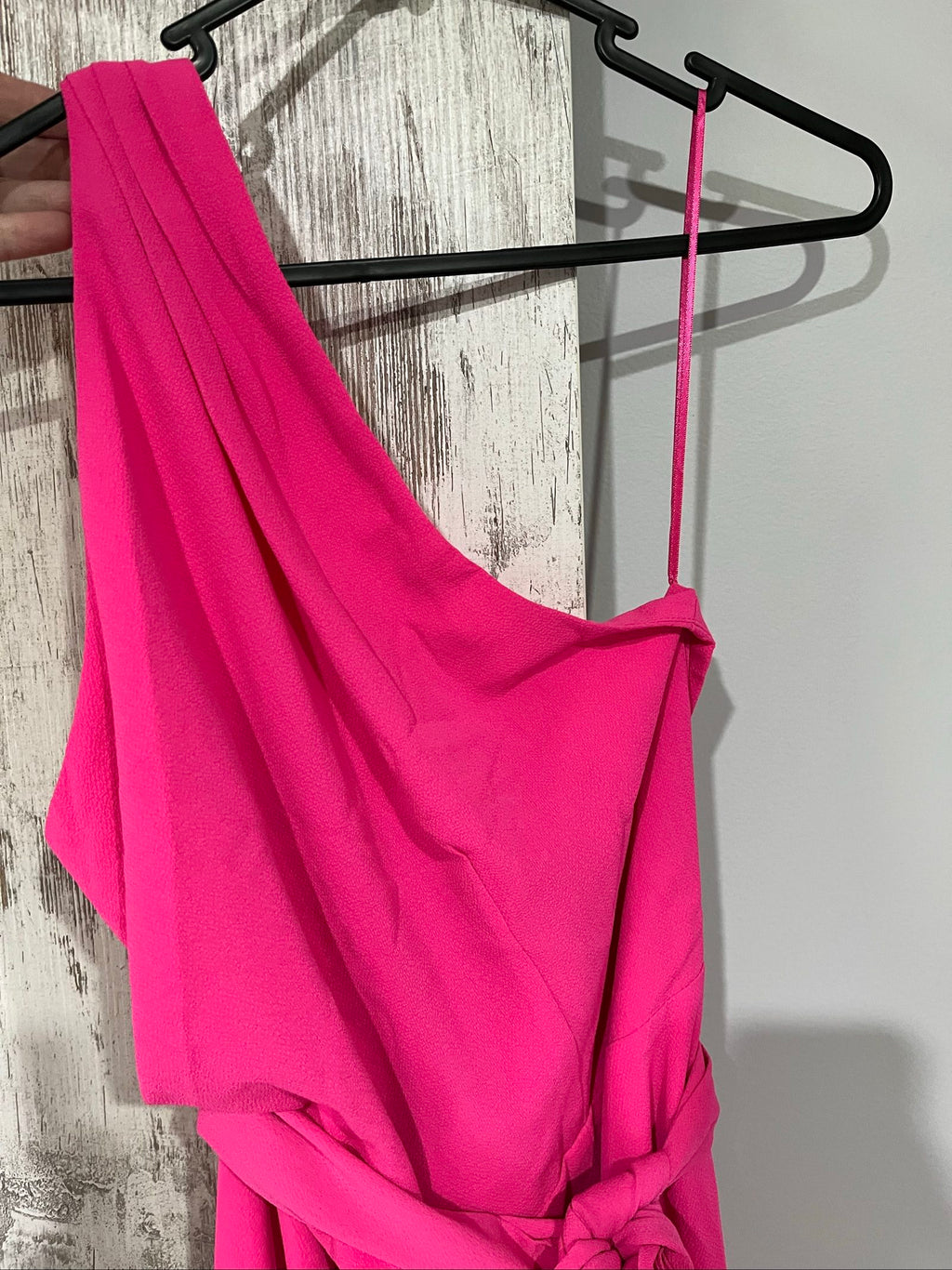 Bianca and Bridget pink one shoulder dress with tie belt and textured fabric.