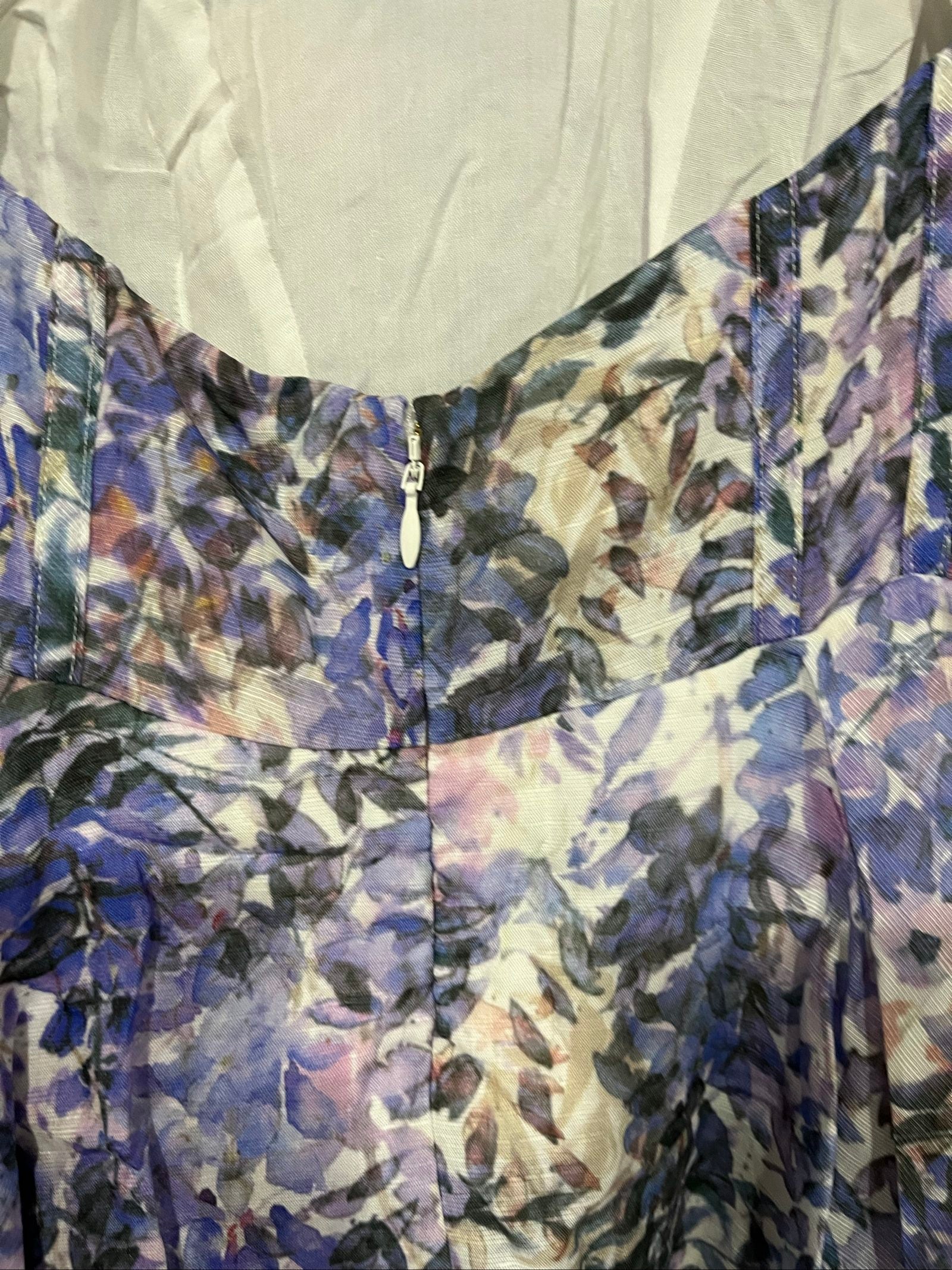 SAINT ARMONT pink purple white floral ruffle maxi dress with puff sleeves and open back.