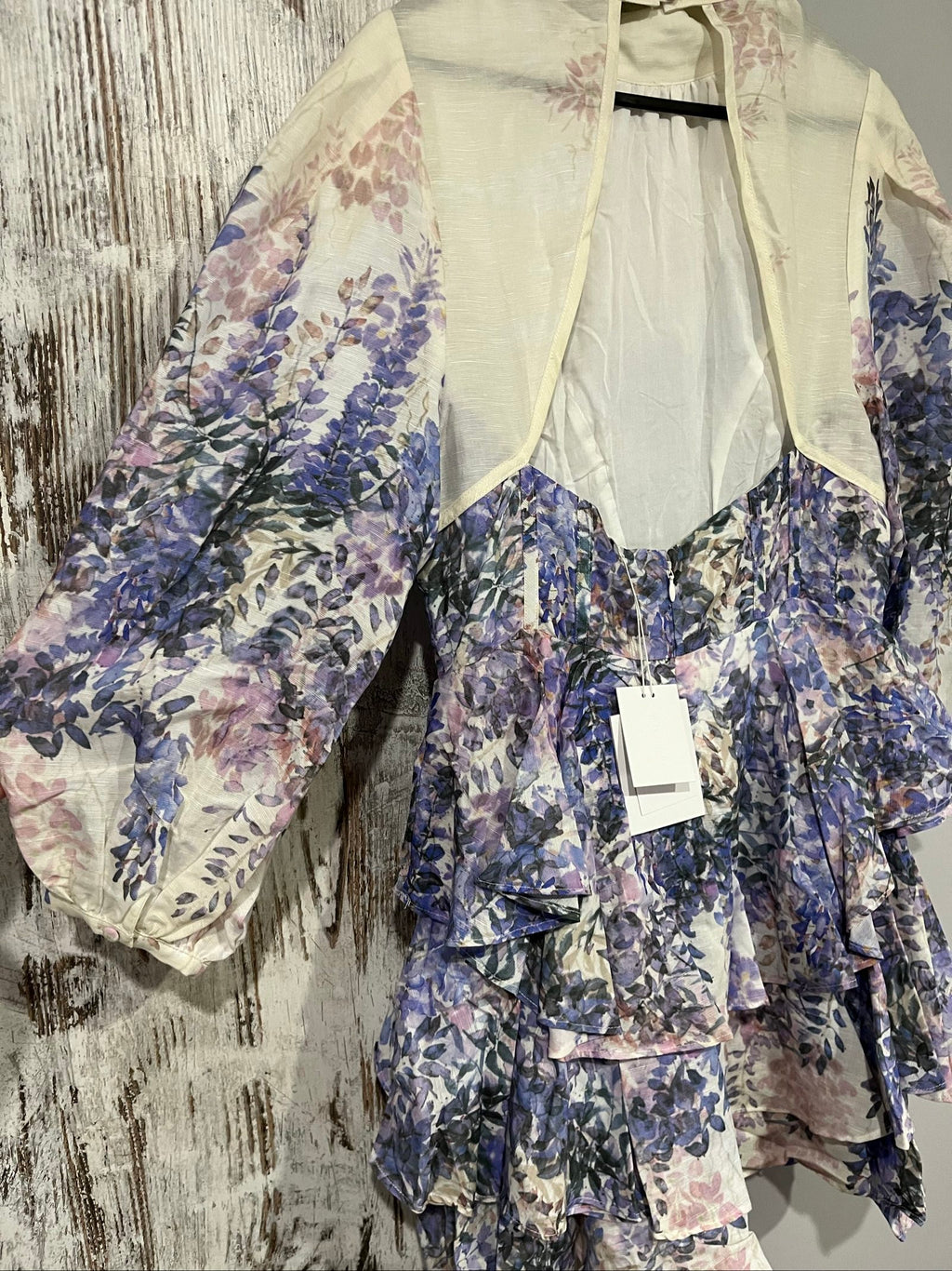 SAINT ARMONT pink purple white floral ruffle maxi dress with puff sleeves and open back.