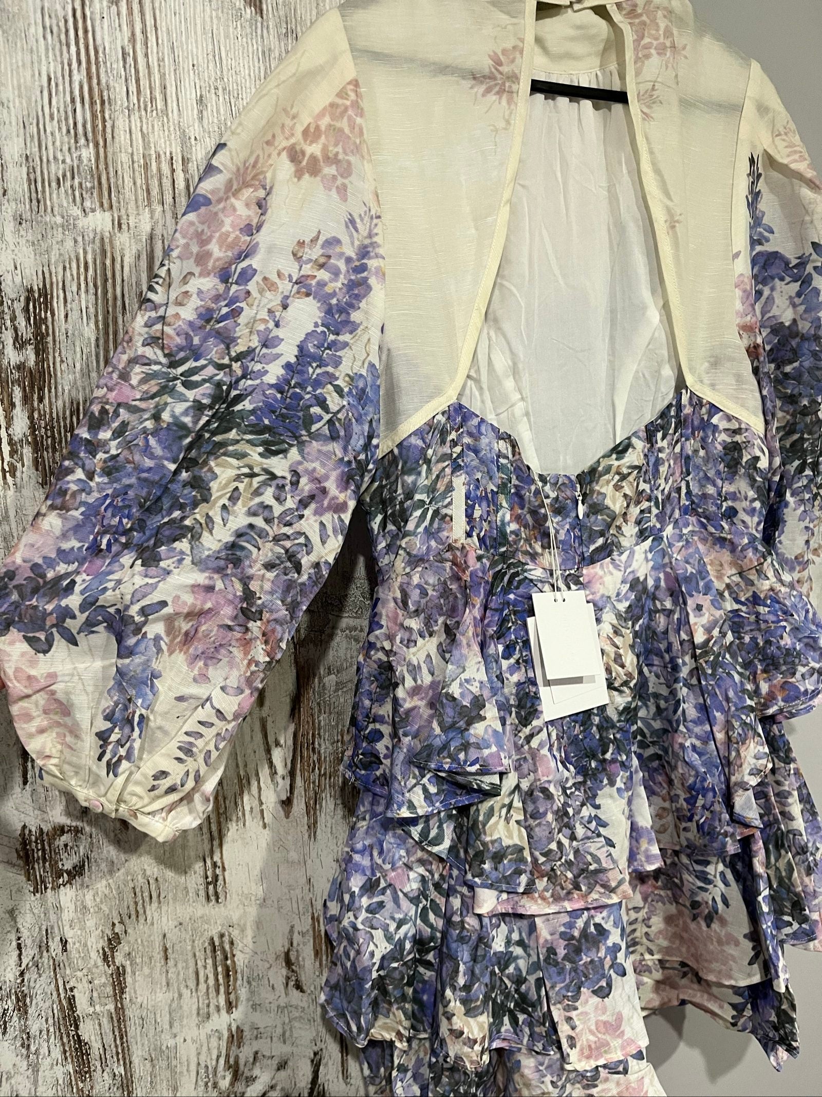 SAINT ARMONT pink purple white floral ruffle maxi dress with puff sleeves and open back.