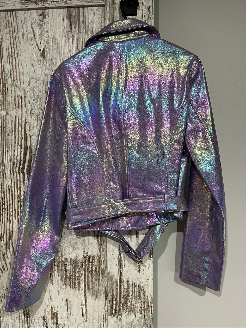 Forever 21 purple iridescent faux leather biker jacket with belted waist and zippered pockets.
