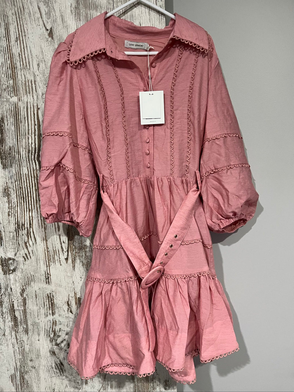SAINT ARMONT pink mini dress with large collar, loop-trim detailing, and puff sleeves.