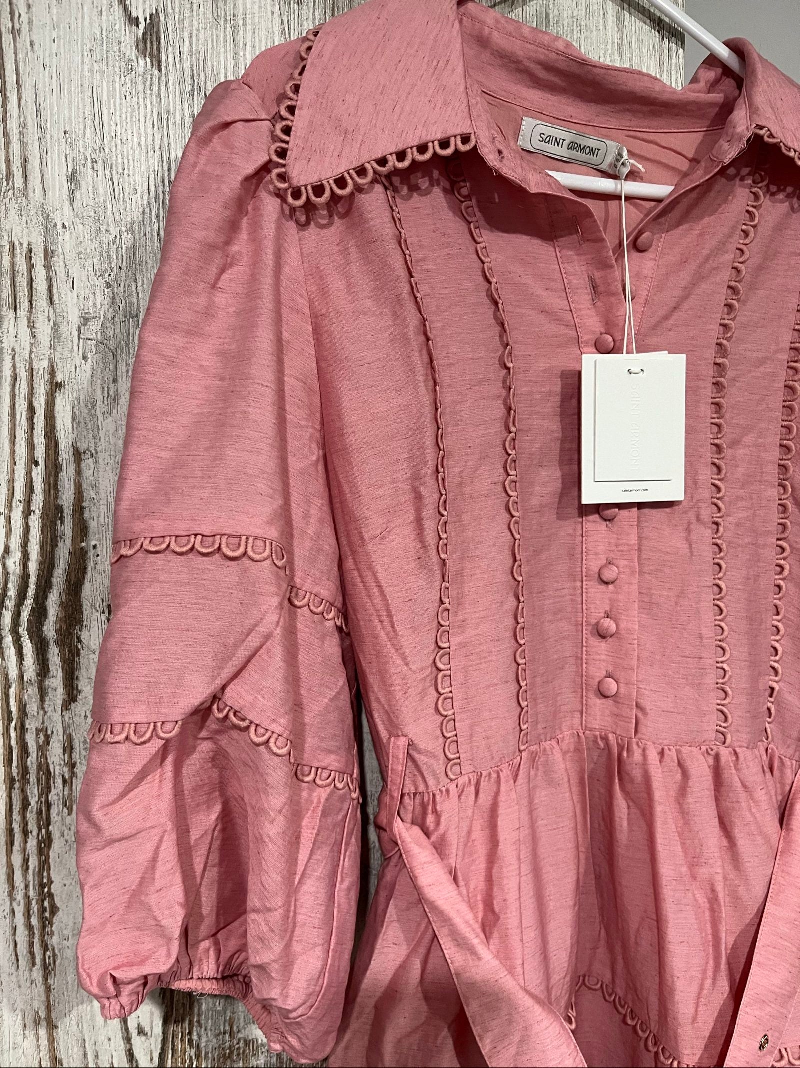 SAINT ARMONT pink mini dress with large collar, loop-trim detailing, and puff sleeves.