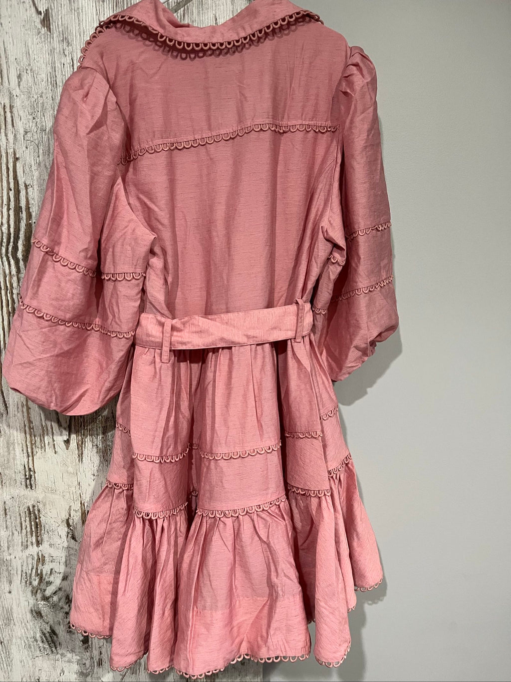 SAINT ARMONT pink mini dress with large collar, loop-trim detailing, and puff sleeves.
