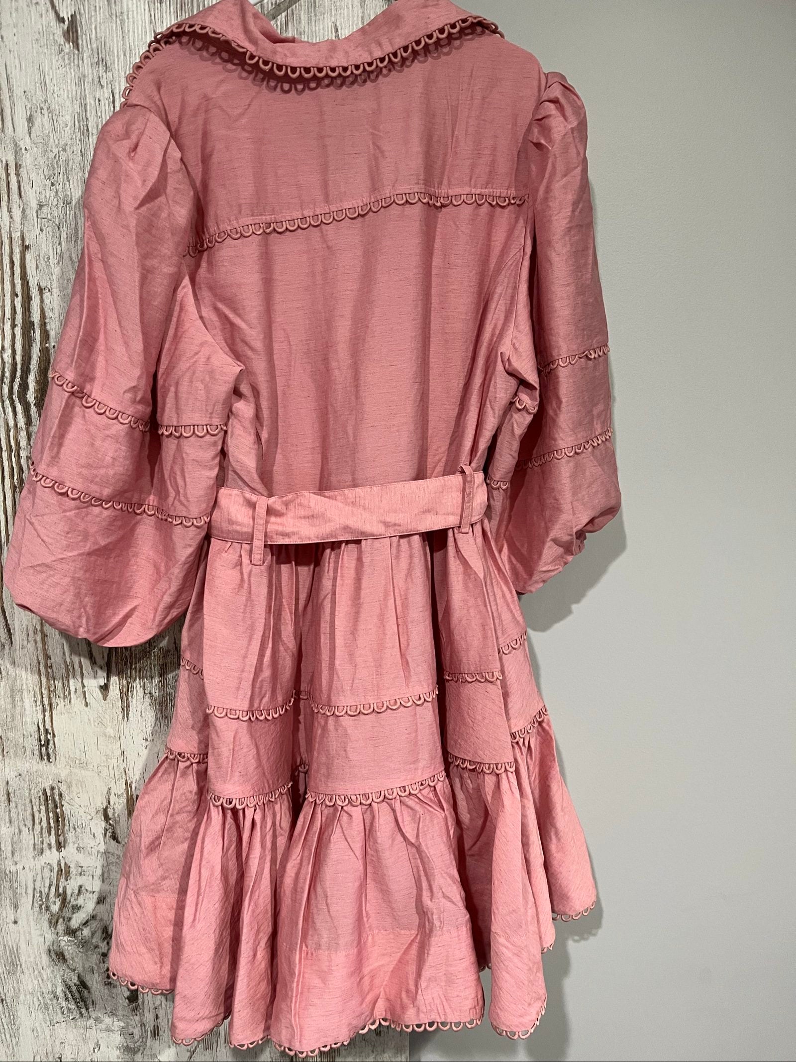 SAINT ARMONT pink mini dress with large collar, loop-trim detailing, and puff sleeves.