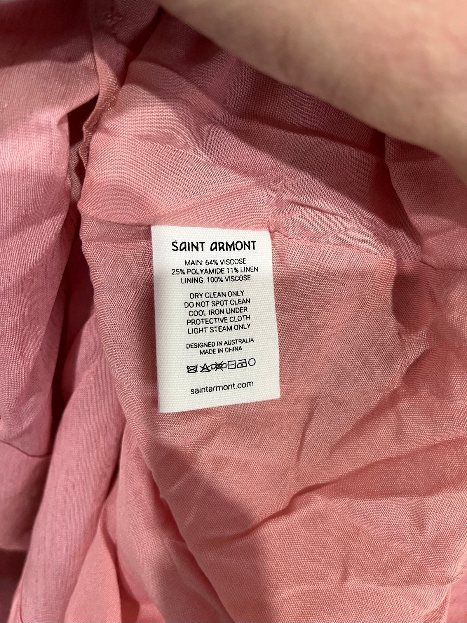 SAINT ARMONT pink mini dress with large collar, loop-trim detailing, and puff sleeves.