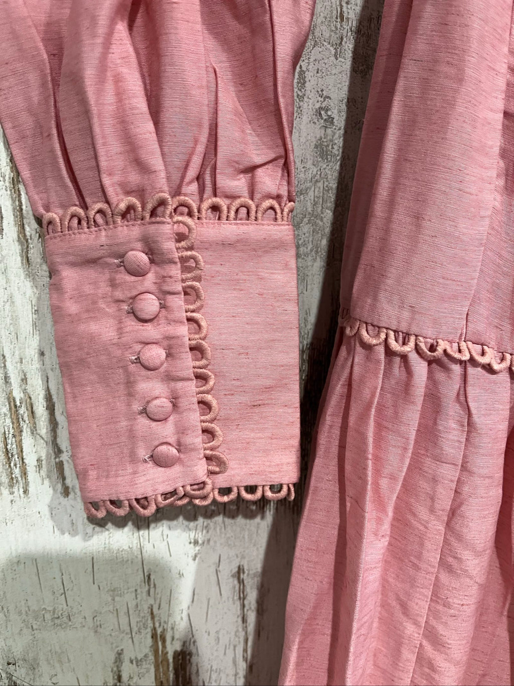 SAINT ARMONT pink lace maxi dress with button front and matching waist belt.