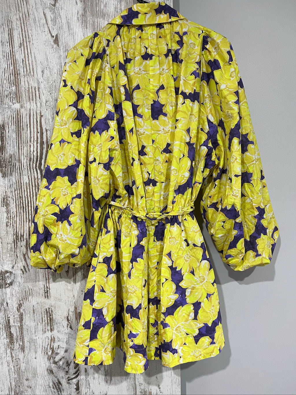 Aureta purple and yellow floral belted blouse with gathered balloon sleeves.