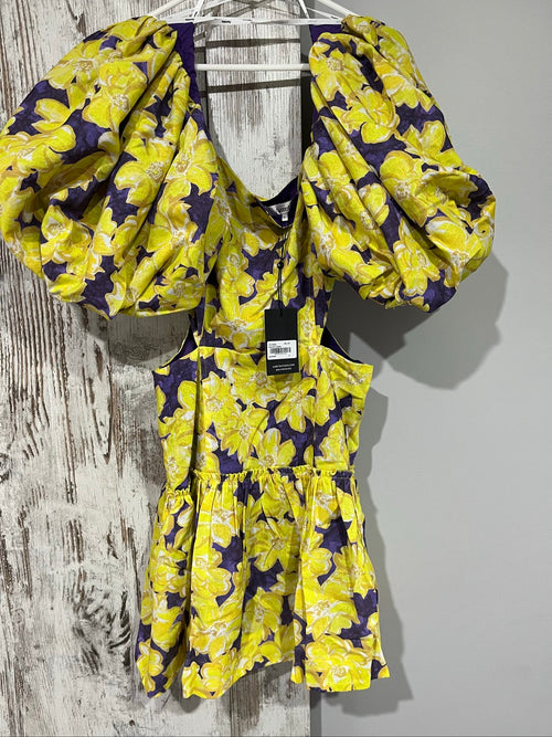 Aureta mini dress yellow and purple floral print with puff sleeves and cut-out waist.