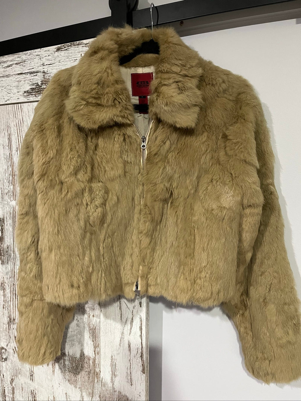 Bomb Boogie beige leather faux fur jacket with full zipper and soft texture.