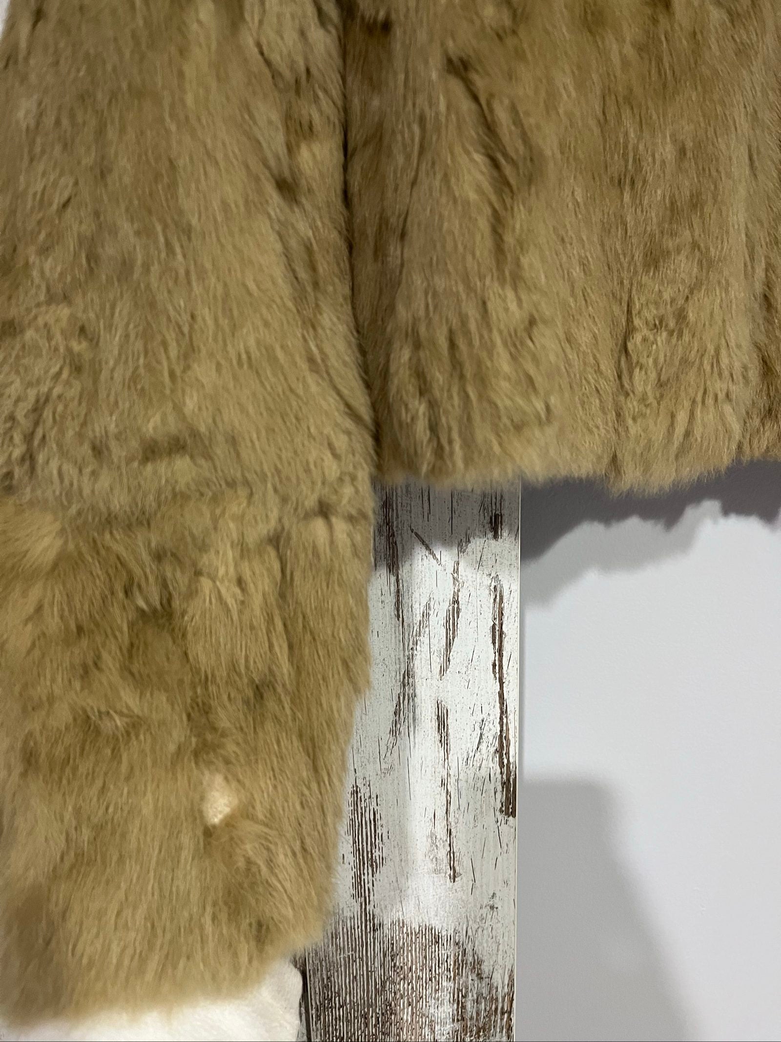 Bomb Boogie beige leather faux fur jacket with full zipper and soft texture.