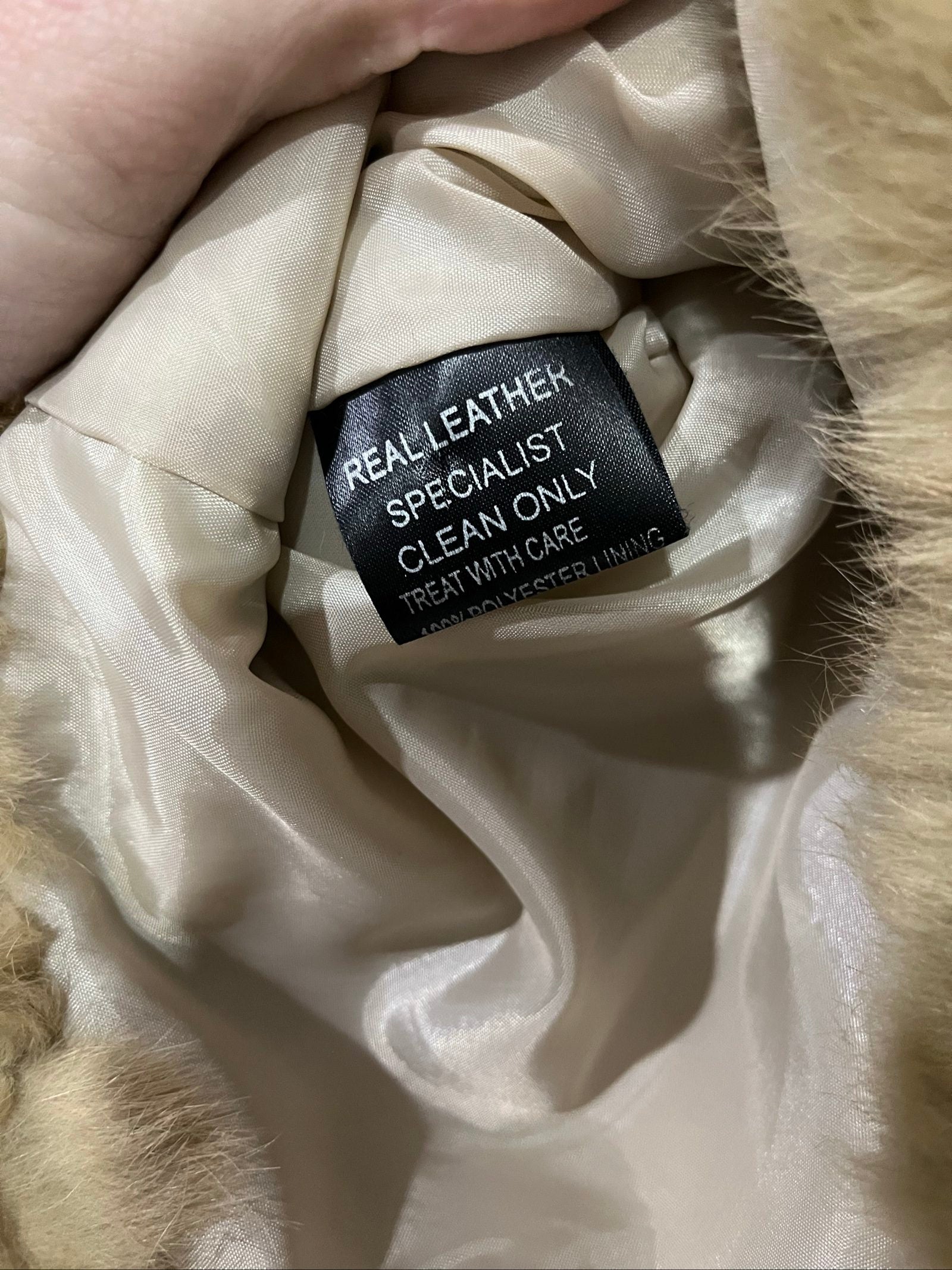 Bomb Boogie beige leather faux fur jacket with full zipper and soft texture.