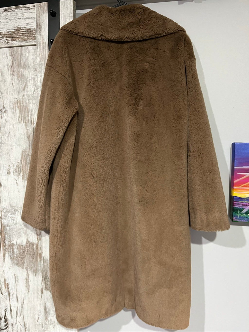 Stand Studio brown faux fur coat oversized fit with button closure and wide lapels.