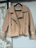 APPARIS beige biker jacket with faux shearling lining, zip-up front, and silver-tone hardware.