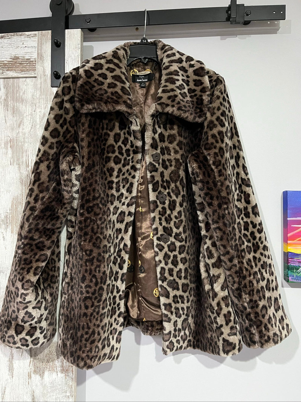 Dennis Basso beige leopard print faux fur coat with wide collar and satin logo lining.