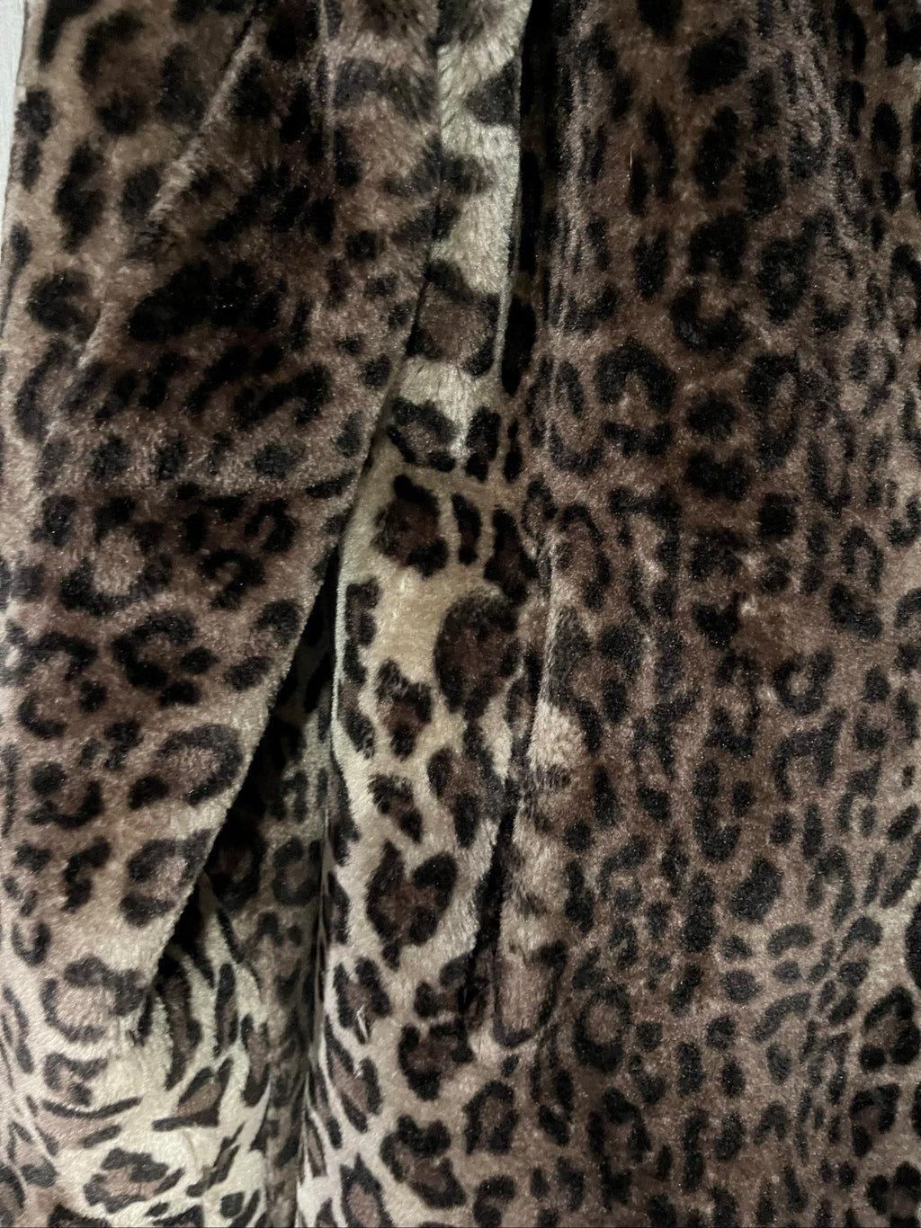 Dennis Basso beige leopard print faux fur coat with wide collar and satin logo lining.