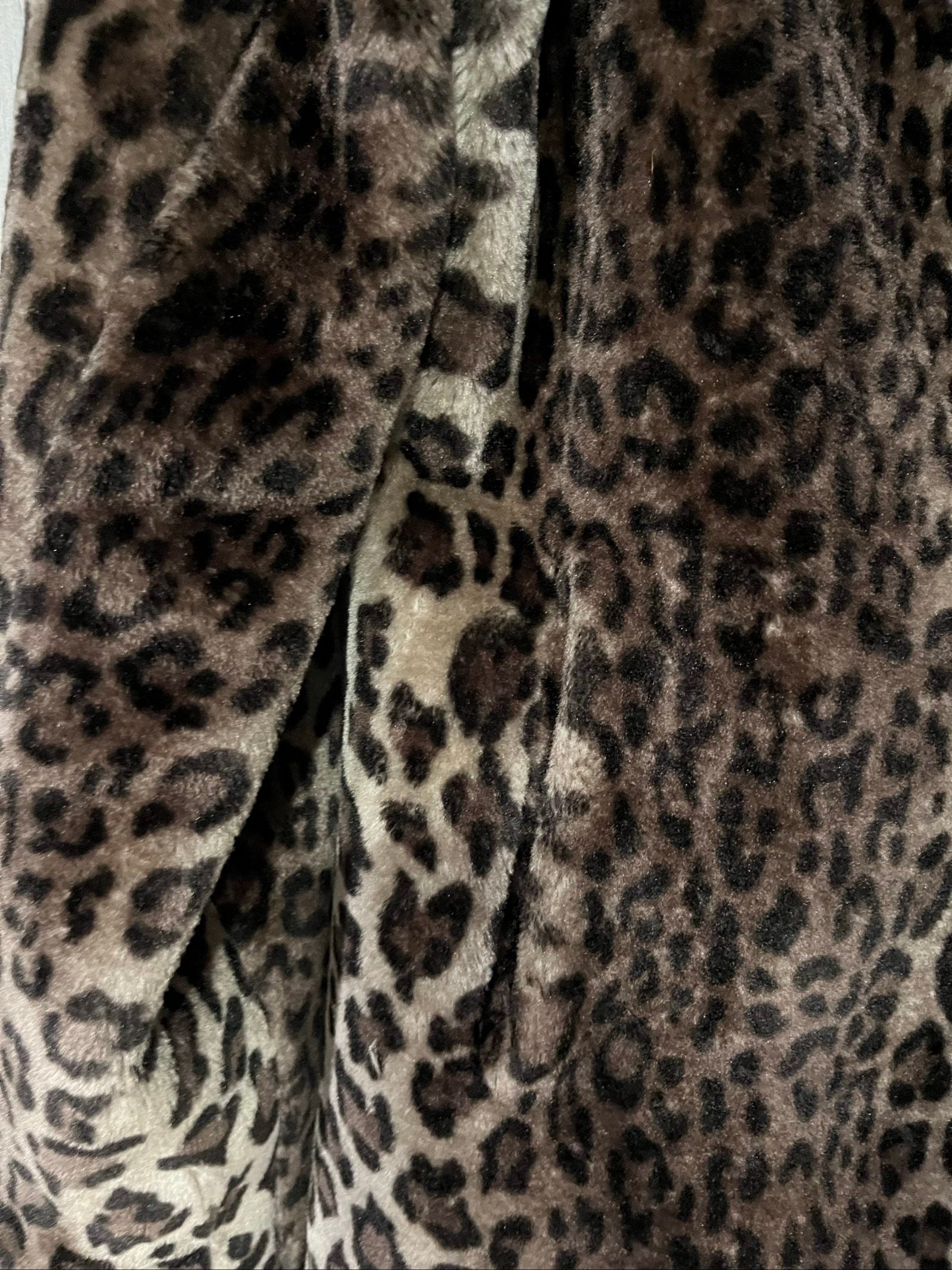 Dennis Basso beige leopard print faux fur coat with wide collar and satin logo lining.