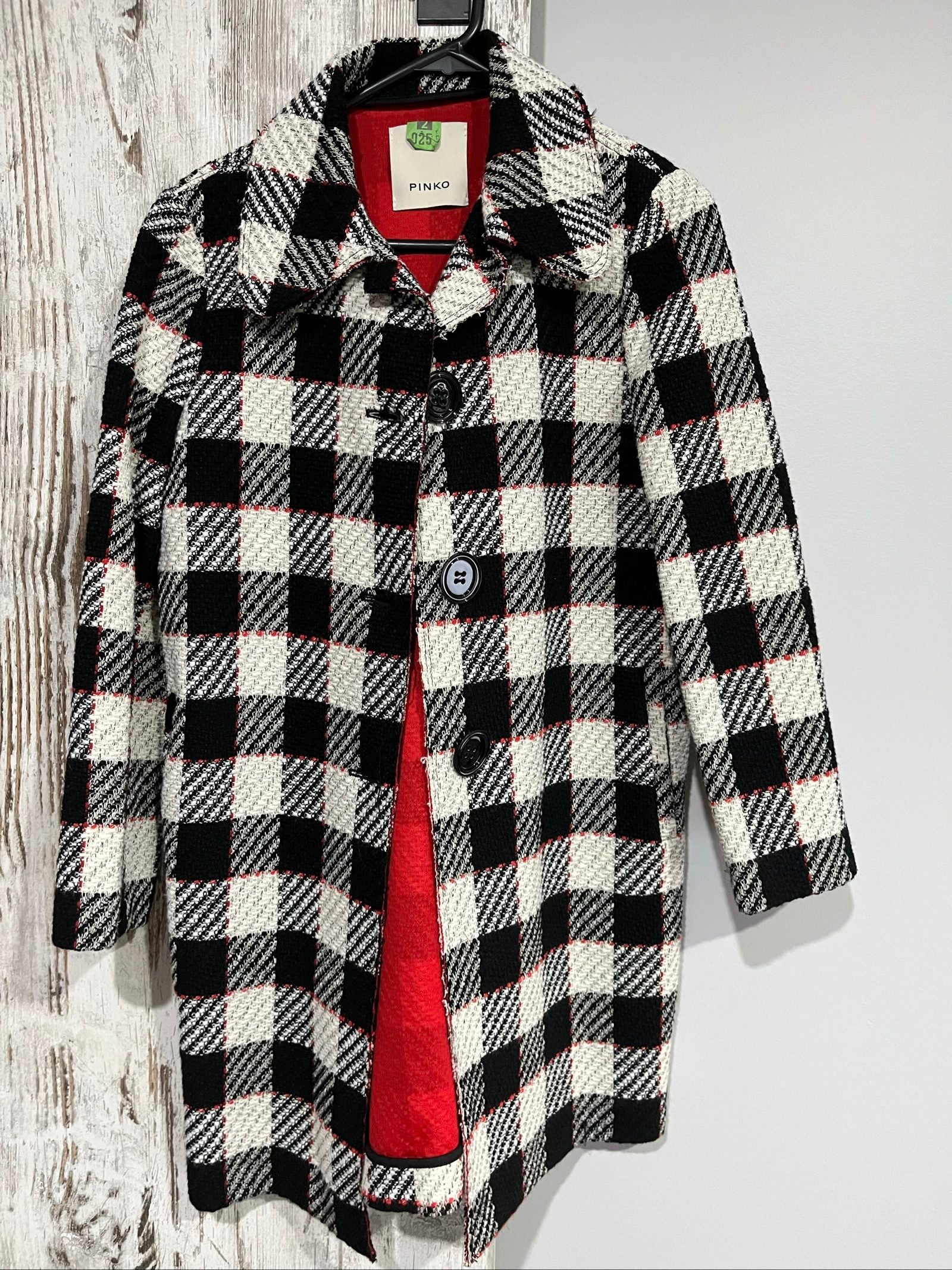 PINKO black and white checkered coat with red lining and black buttons.