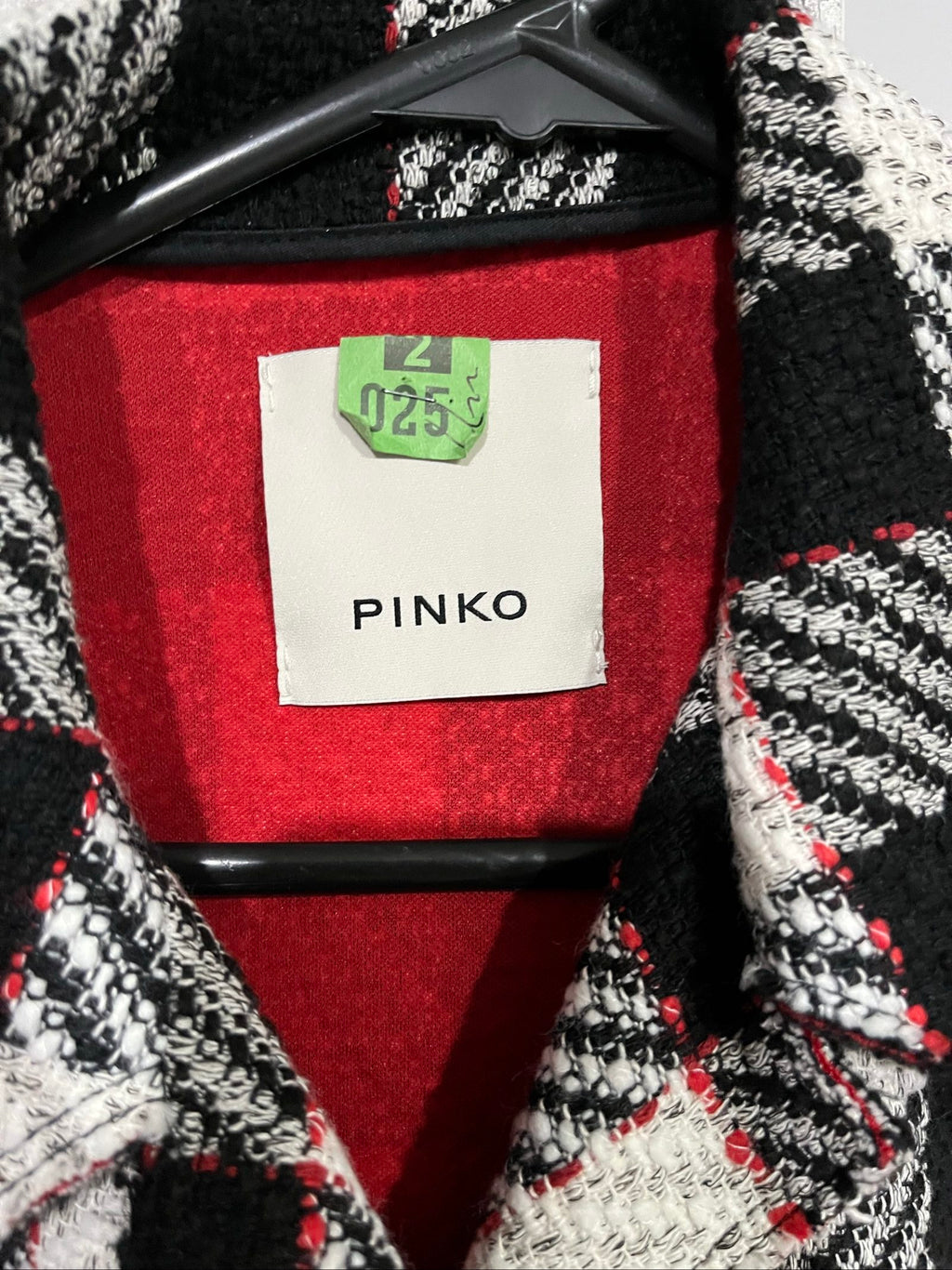 PINKO black and white checkered coat with red lining and black buttons.