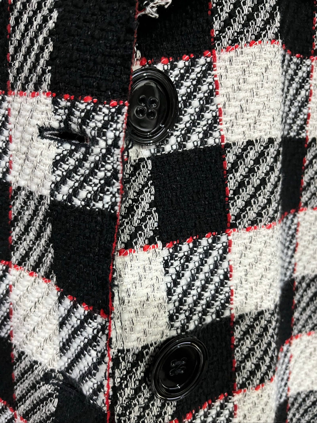 PINKO black and white checkered coat with red lining and black buttons.