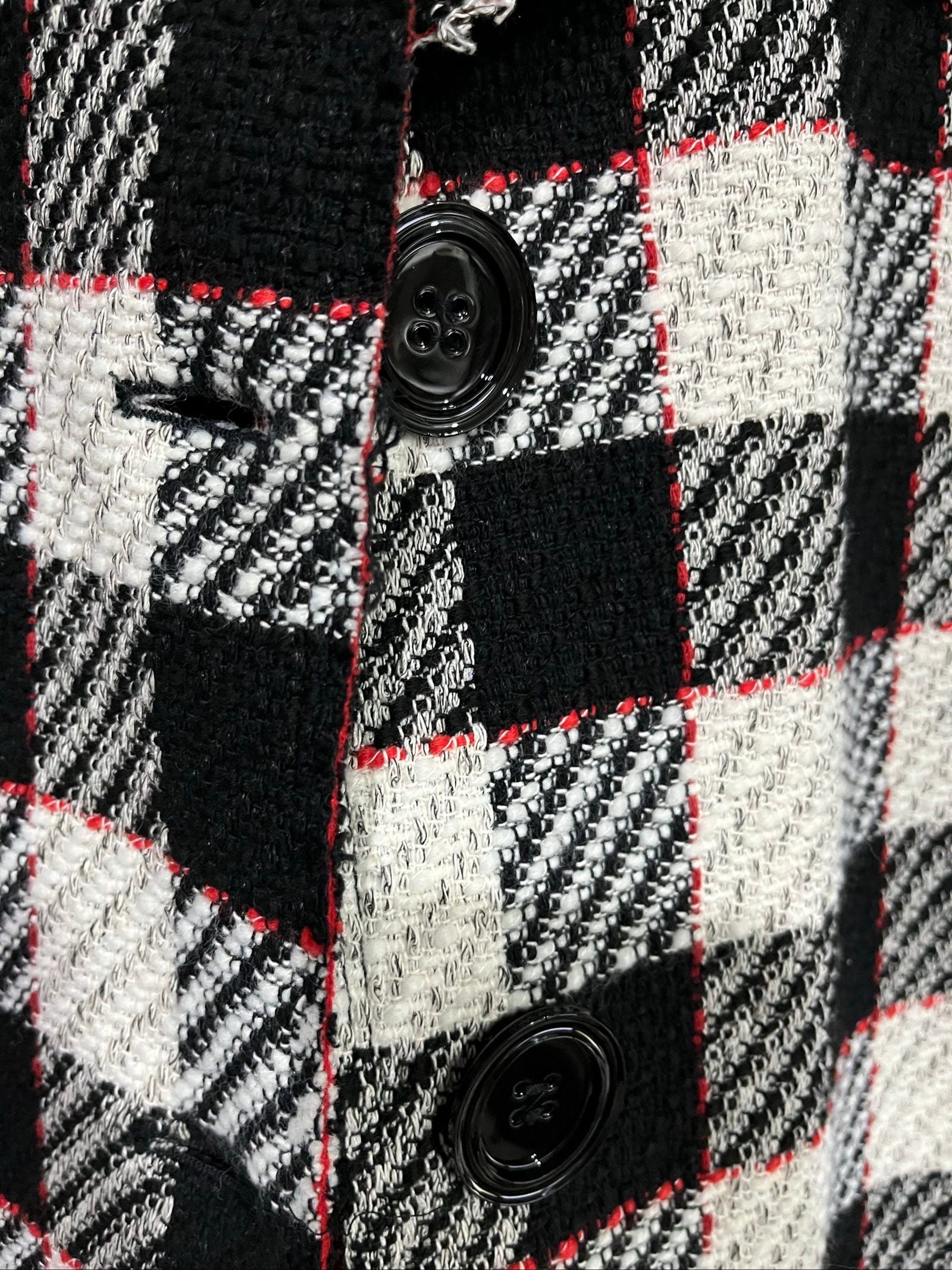 PINKO black and white checkered coat with red lining and black buttons.