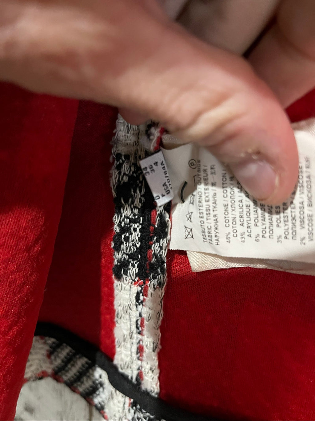 PINKO black and white checkered coat with red lining and black buttons.