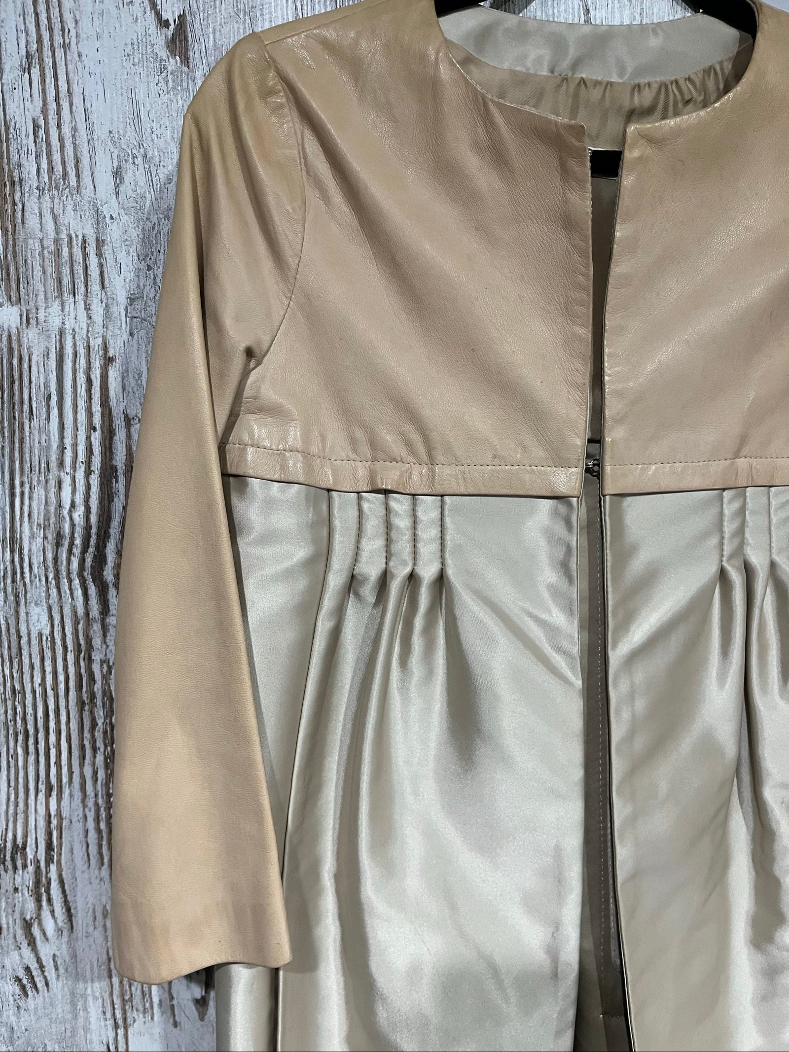 PINKO beige and cream coat with leather upper, pleated details, round neckline.