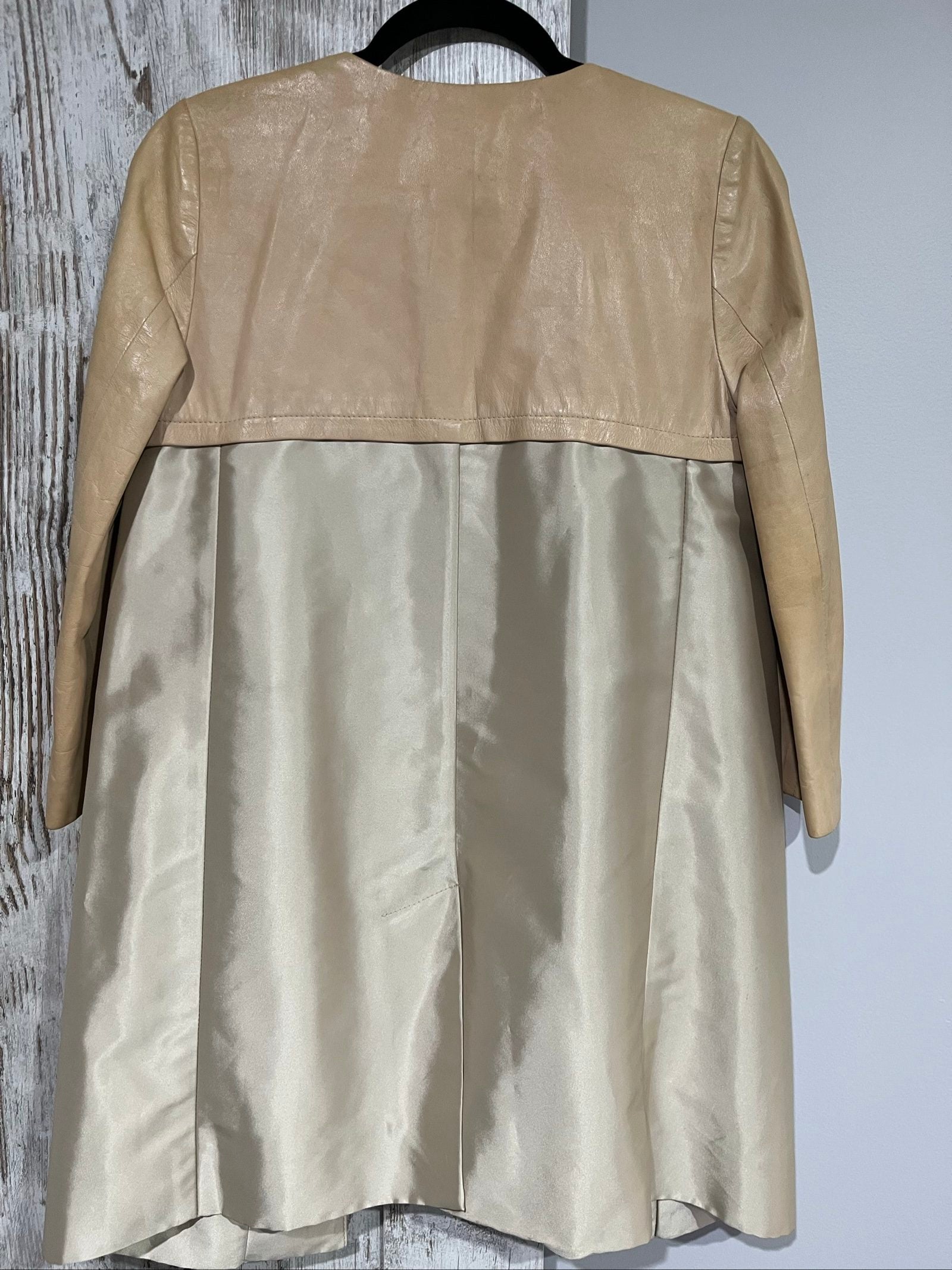PINKO beige and cream coat with leather upper, pleated details, round neckline.