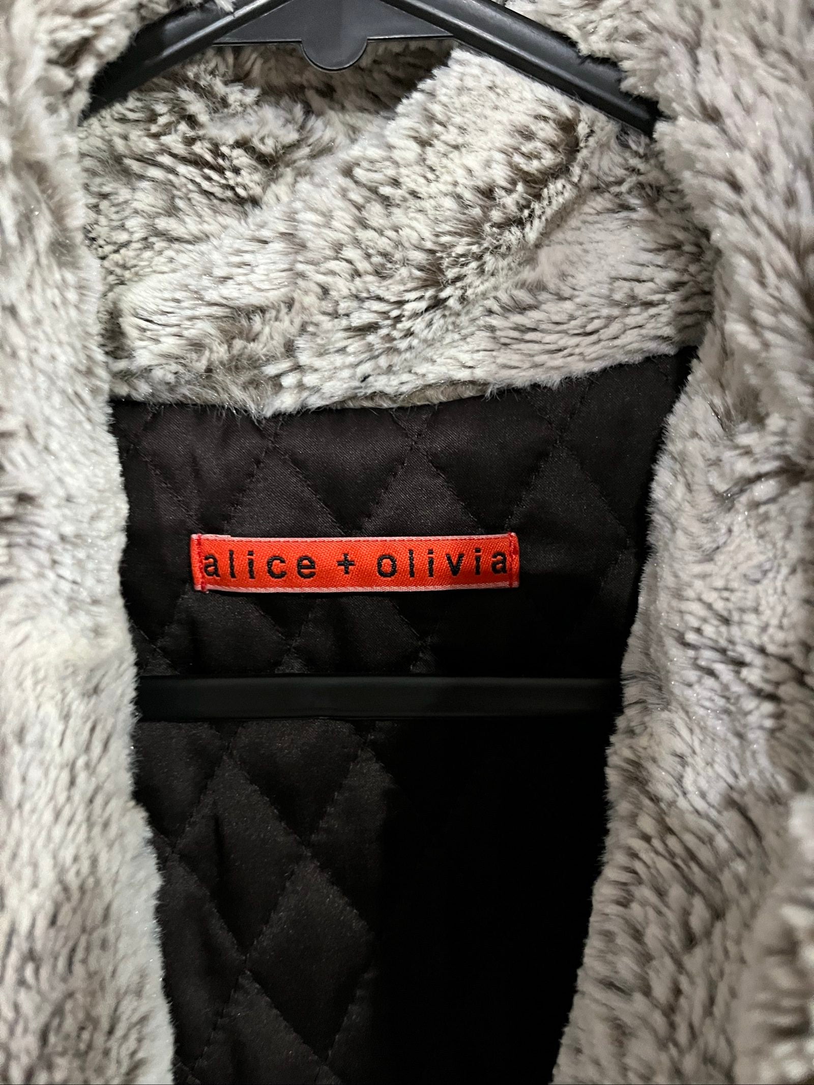 alice + olivia beige faux fur sleeveless vest with quilted black lining and side pockets